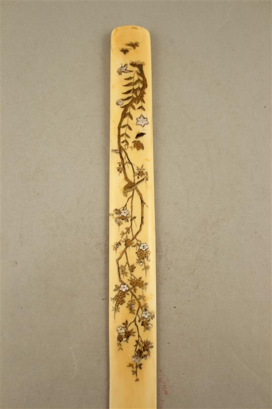 A Japanese ivory and shibayama type page turner, Meiji period, 38cm., restorations